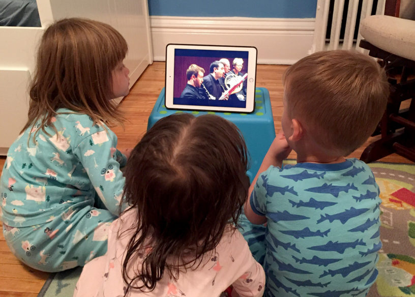 Kids watching concert on tablet